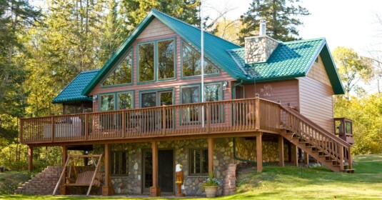 Klauer Steel Siding on a three-story home in a brown color.